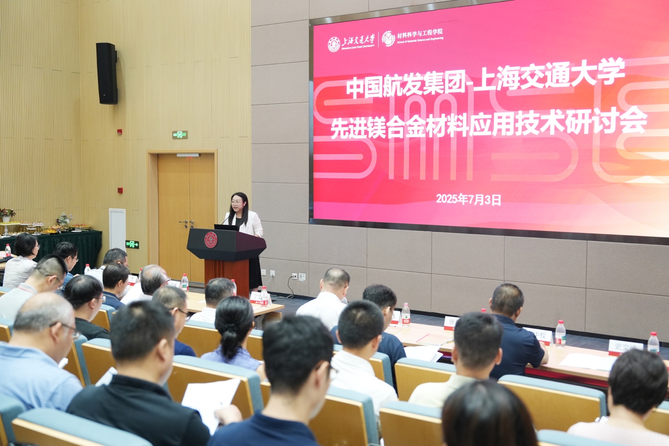 A person standing at a podium giving a presentation

Description automatically generated